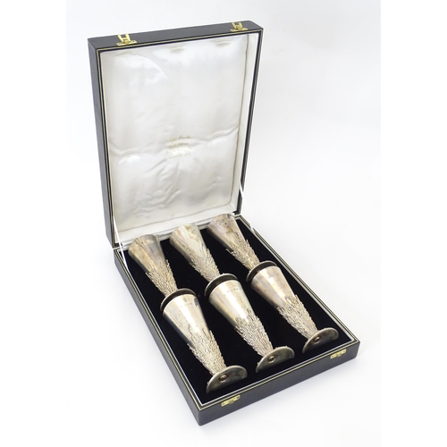 264 - Jocelyn Burton : A cased set of six Elizabeth II Modernist silver goblets / flutes, of conical form ... 