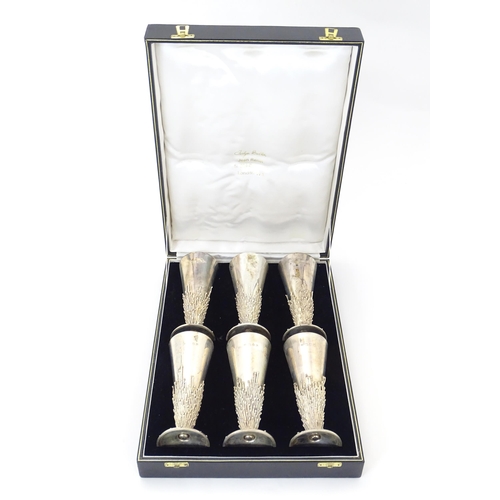 264 - Jocelyn Burton : A cased set of six Elizabeth II Modernist silver goblets / flutes, of conical form ... 