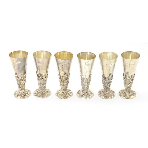 264 - Jocelyn Burton : A cased set of six Elizabeth II Modernist silver goblets / flutes, of conical form ... 