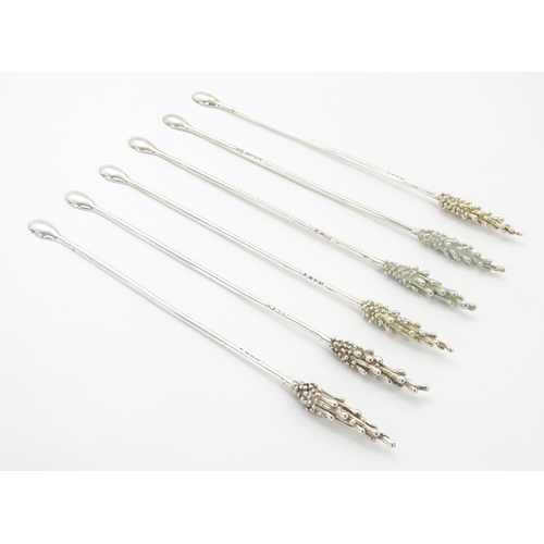 265 - Jocelyn Burton : A matched set of six Elizabeth II Modernist silver cocktail spoons / stirrers, with... 