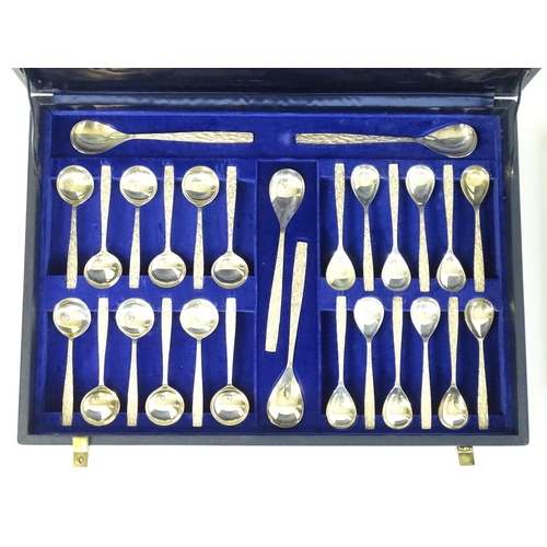 274 - Christopher Nigel Lawrence : An Elizabeth II Modernist silver 12 place canteen of cutlery / flatware... 