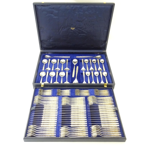 274 - Christopher Nigel Lawrence : An Elizabeth II Modernist silver 12 place canteen of cutlery / flatware... 