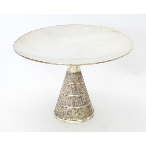 272 - Christopher Nigel Lawrence : An Elizabeth II Modernist silver tazza / comport with  textured conical... 