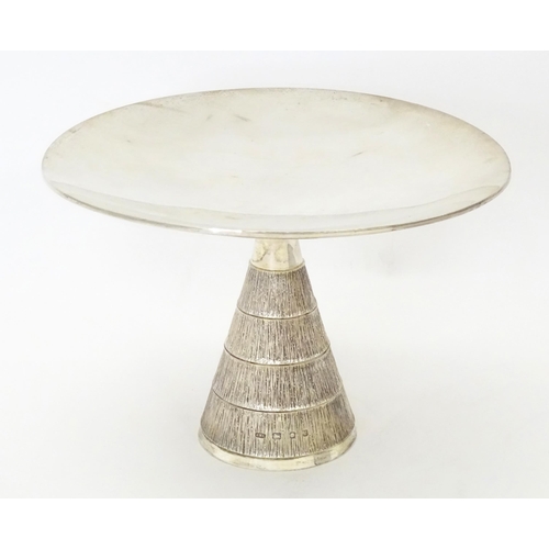 272 - Christopher Nigel Lawrence : An Elizabeth II Modernist silver tazza / comport with  textured conical... 