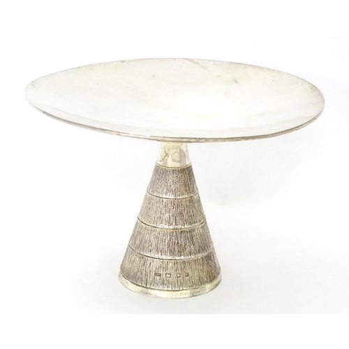 272 - Christopher Nigel Lawrence : An Elizabeth II Modernist silver tazza / comport with  textured conical... 