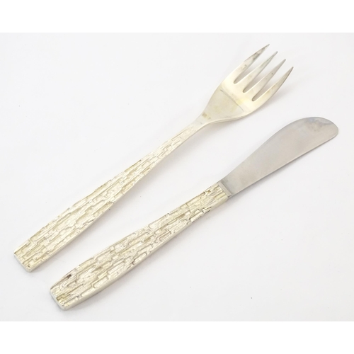 274 - Christopher Nigel Lawrence : An Elizabeth II Modernist silver 12 place canteen of cutlery / flatware... 