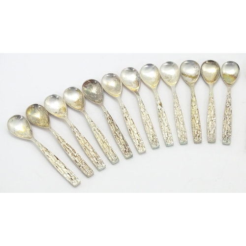 274 - Christopher Nigel Lawrence : An Elizabeth II Modernist silver 12 place canteen of cutlery / flatware... 