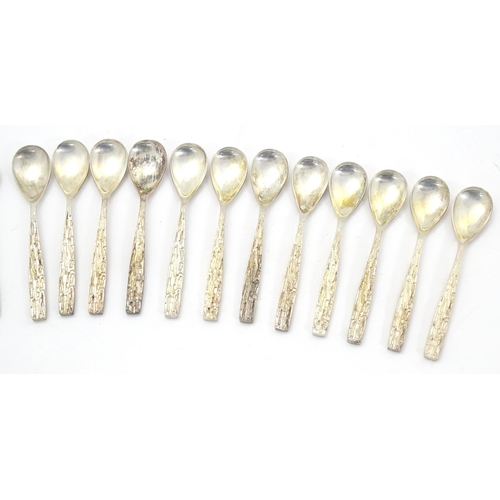 274 - Christopher Nigel Lawrence : An Elizabeth II Modernist silver 12 place canteen of cutlery / flatware... 