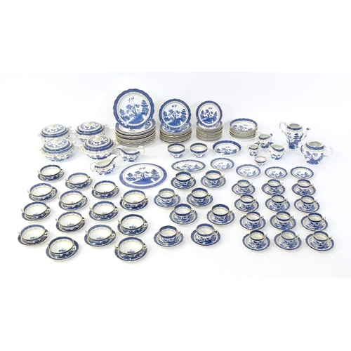 149 - A large quantity of blue and white tea and dinner wares in the pattern Real Old Willow, to include d... 