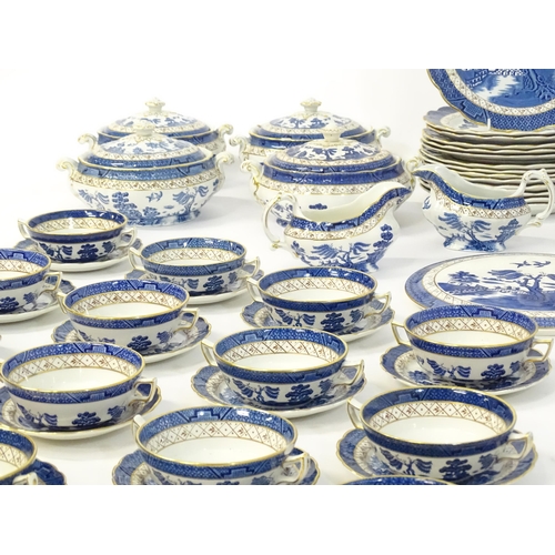 149 - A large quantity of blue and white tea and dinner wares in the pattern Real Old Willow, to include d... 