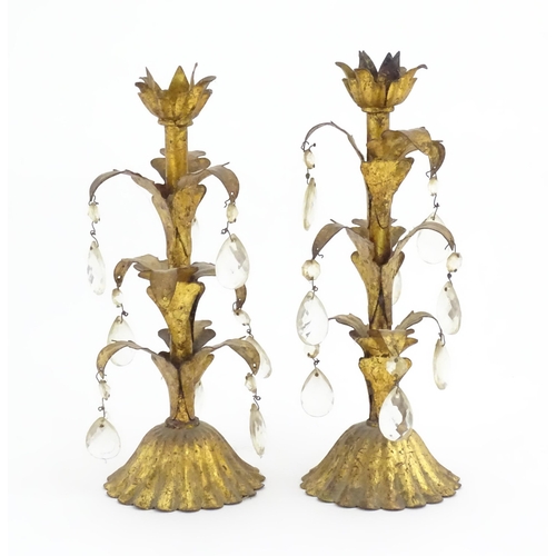 971 - Two late 19th / early 20thC gilt metal candlestick with foliate detail and lustre drops. Approx. 12 ... 