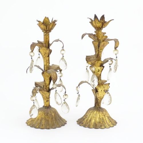 971 - Two late 19th / early 20thC gilt metal candlestick with foliate detail and lustre drops. Approx. 12 ... 