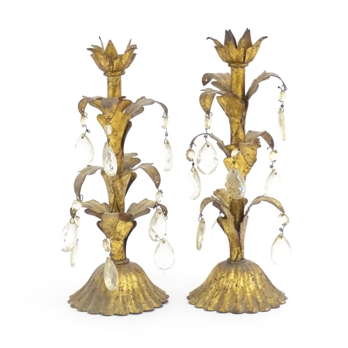 971 - Two late 19th / early 20thC gilt metal candlestick with foliate detail and lustre drops. Approx. 12 ... 