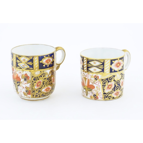 116A - A Royal Crown Derby coffee cup and saucer decorated in the Imari pattern. Marked under no. 2451. Tog... 