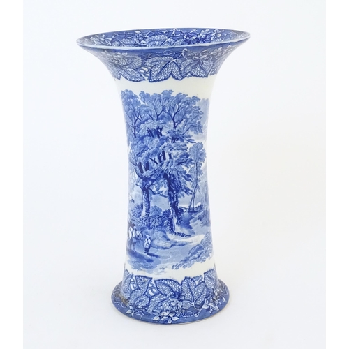 151A - A Masons blue and white vase of flared cylindrical form decorated with a country / farm landscape. W... 