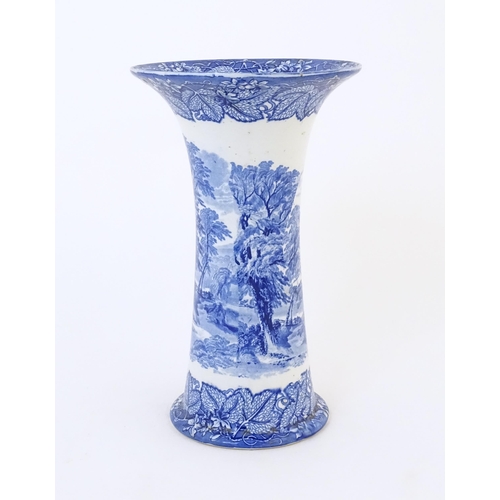 151A - A Masons blue and white vase of flared cylindrical form decorated with a country / farm landscape. W... 