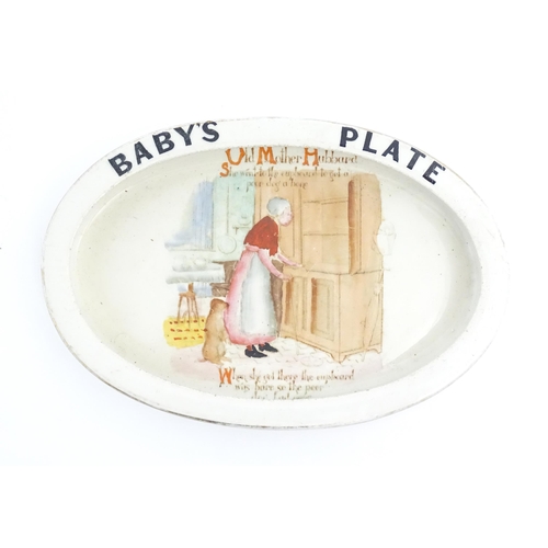 141A - A Carlton Ware oval baby plate depicting Old Mother Hubbard. Marked under. Approx. 6 1/4