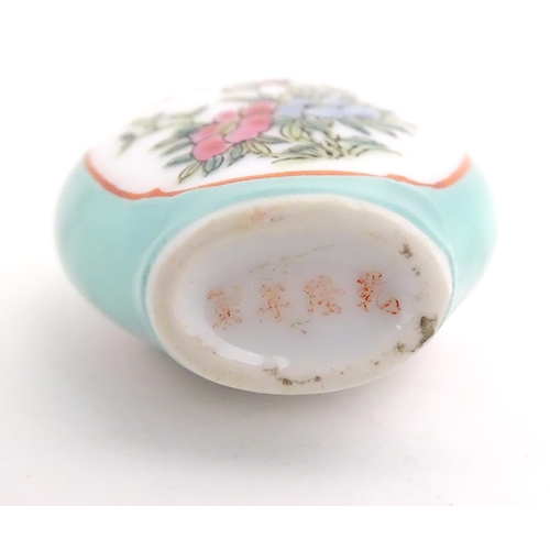 1004 - Three Chinese snuff bottles to include a glass example with hand painted landscape detail. Largest a... 