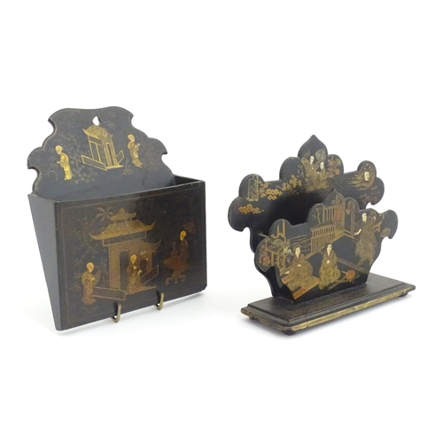 1008 - A late 19th / early 20thC lacquered papier mache walling hanging letter rack with chinoiserie decora... 