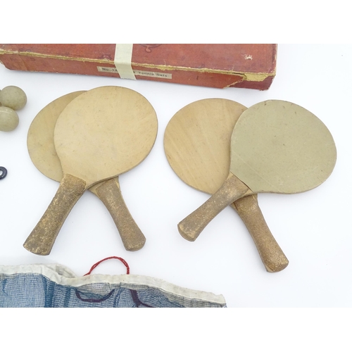 836 - Toys : An early 20thC boxed table tennis set by Kay Sports Co, London, comprising four bats, balls a... 