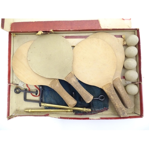 836 - Toys : An early 20thC boxed table tennis set by Kay Sports Co, London, comprising four bats, balls a... 