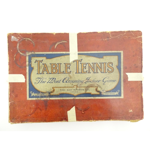 836 - Toys : An early 20thC boxed table tennis set by Kay Sports Co, London, comprising four bats, balls a... 