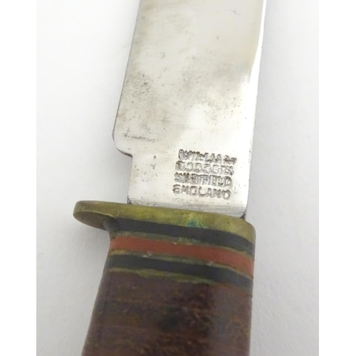 1035 - A mid 20thC hunting sheath knife by William Rogers (John Clarke & Co), Sheffield, approx 5