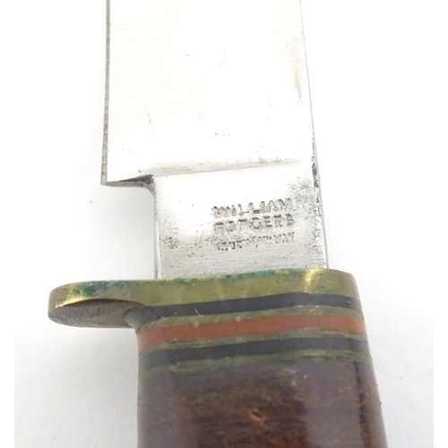 1035 - A mid 20thC hunting sheath knife by William Rogers (John Clarke & Co), Sheffield, approx 5