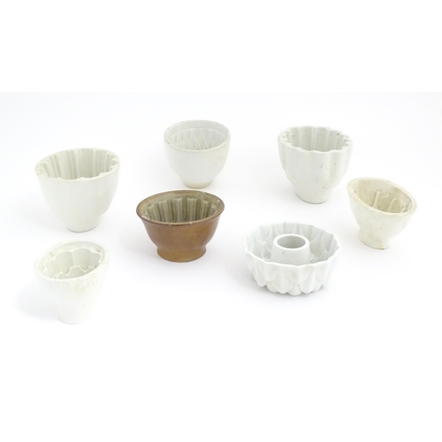 1049 - A quantity of Victorian and later ceramic jelly moulds to include examples by Booths, Shelley, etc. ... 