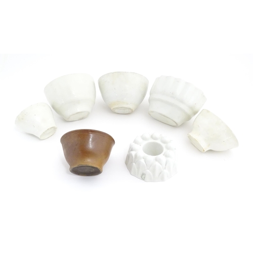 1049 - A quantity of Victorian and later ceramic jelly moulds to include examples by Booths, Shelley, etc. ... 