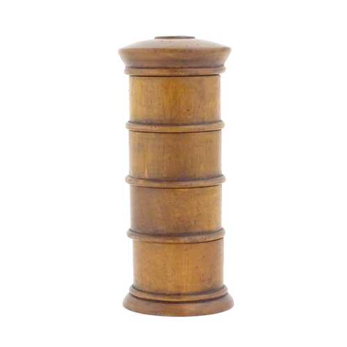 1058 - A four tier treen spice tower labelled Cloves, Ginger, Mace, and Nutmeg. Approx. 7 1/2