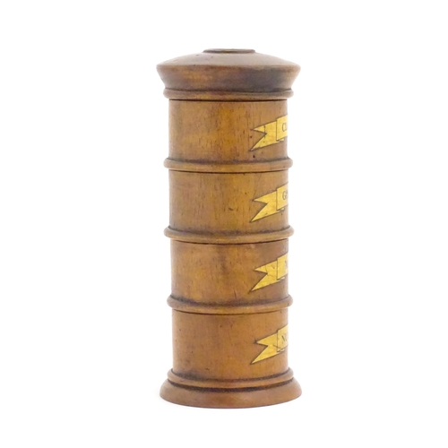 1058 - A four tier treen spice tower labelled Cloves, Ginger, Mace, and Nutmeg. Approx. 7 1/2