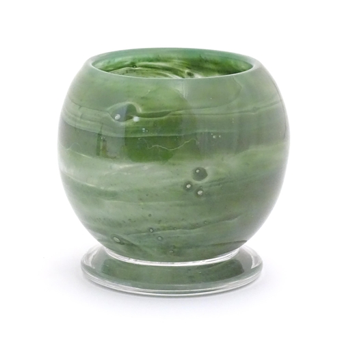 155 - An Art Deco Art Glass bowl with green swirled detail and circular foot. Approx 4