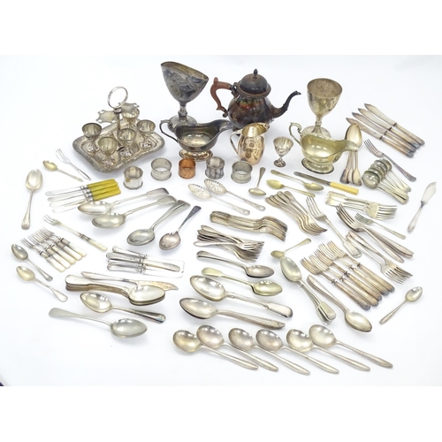 541 - A quantity of assorted silver plated wares to include flatware / cutlery together with cream jug, sa... 