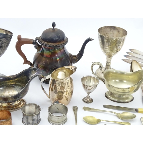 541 - A quantity of assorted silver plated wares to include flatware / cutlery together with cream jug, sa... 