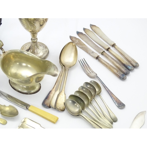 541 - A quantity of assorted silver plated wares to include flatware / cutlery together with cream jug, sa... 