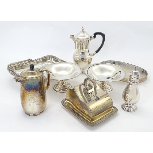 544 - A quantity of assorted silver plated wares to include a hot water pot by Garrard & Co. Ltd., a chees... 