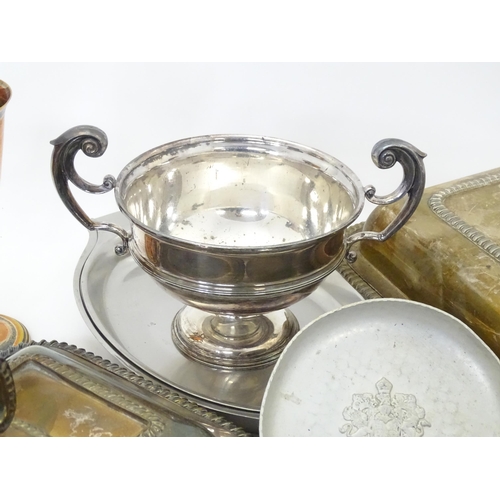 545 - A quantity of assorted silver plate, brass, metalwares, to include serving dishes, trophy cups, cand... 