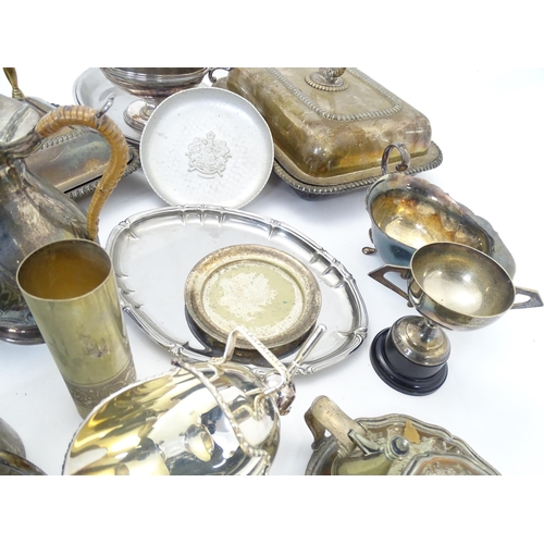 545 - A quantity of assorted silver plate, brass, metalwares, to include serving dishes, trophy cups, cand... 