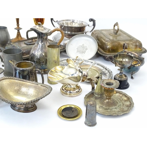 545 - A quantity of assorted silver plate, brass, metalwares, to include serving dishes, trophy cups, cand... 