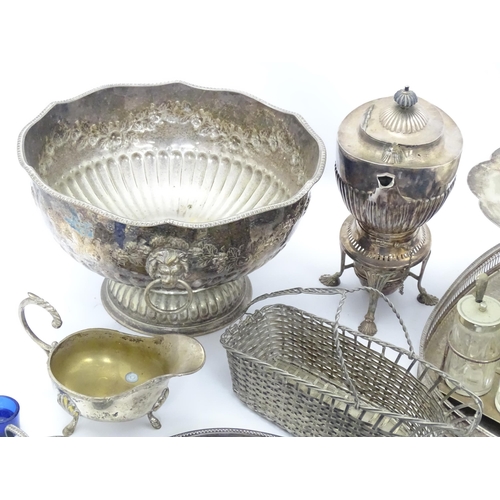 548 - A quantity of assorted silver plate items to include punch bowl, cups, ladle, serving dishes, flatwa... 