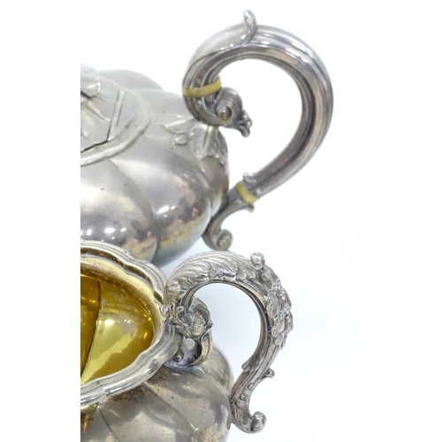 549 - A 19thC silver plate matched four piece tea set comprising teapot, coffee pot, hot water jug and sug... 