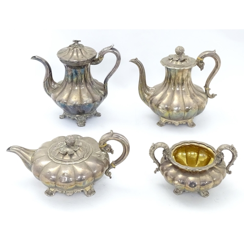 549 - A 19thC silver plate matched four piece tea set comprising teapot, coffee pot, hot water jug and sug... 