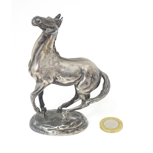 371 - A silver model of a horse 'Playing Up', after Lorne McKean, hallmarked London 1975, maker John Pinch... 