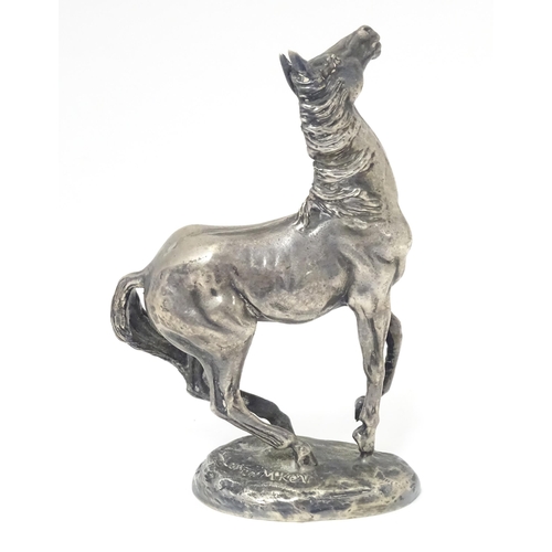 371 - A silver model of a horse 'Playing Up', after Lorne McKean, hallmarked London 1975, maker John Pinch... 