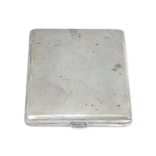 379 - A Continental .835 silver cigarette case with engine turned decoration and gilded interior. Approx. ... 