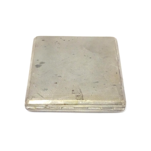 379 - A Continental .835 silver cigarette case with engine turned decoration and gilded interior. Approx. ... 