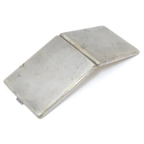 379 - A Continental .835 silver cigarette case with engine turned decoration and gilded interior. Approx. ... 