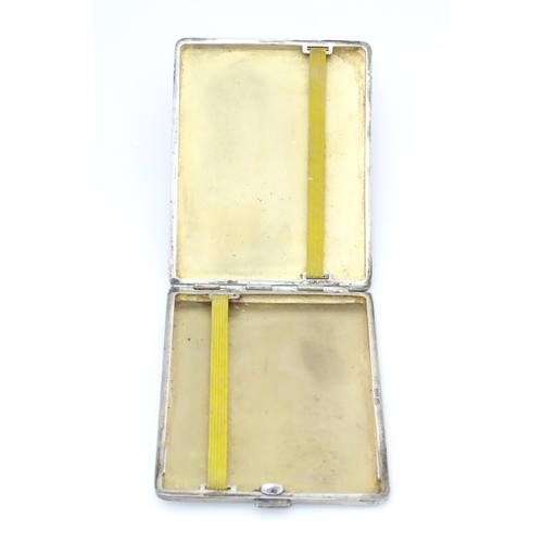 379 - A Continental .835 silver cigarette case with engine turned decoration and gilded interior. Approx. ... 