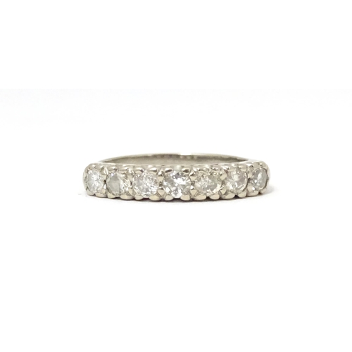 622 - An 18ct white gold half eternity ring set with seven diamonds in a linear setting. Ring size approx.... 